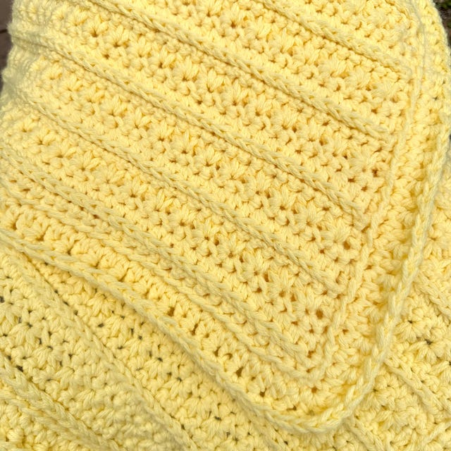 A customer's finished Petal Loop Stitch Blanket Crochet Pattern + Video Tutorial