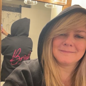 Marjorie added a photo of their purchase