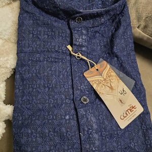 Devika added a photo of their purchase