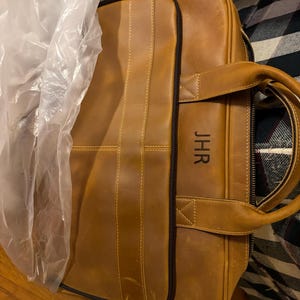 Samantha added a photo of their purchase