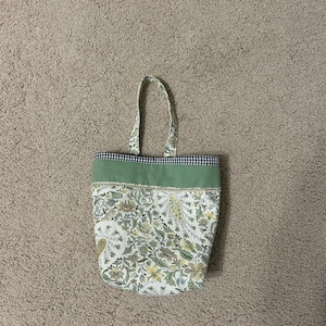 Sarah added a photo of their purchase