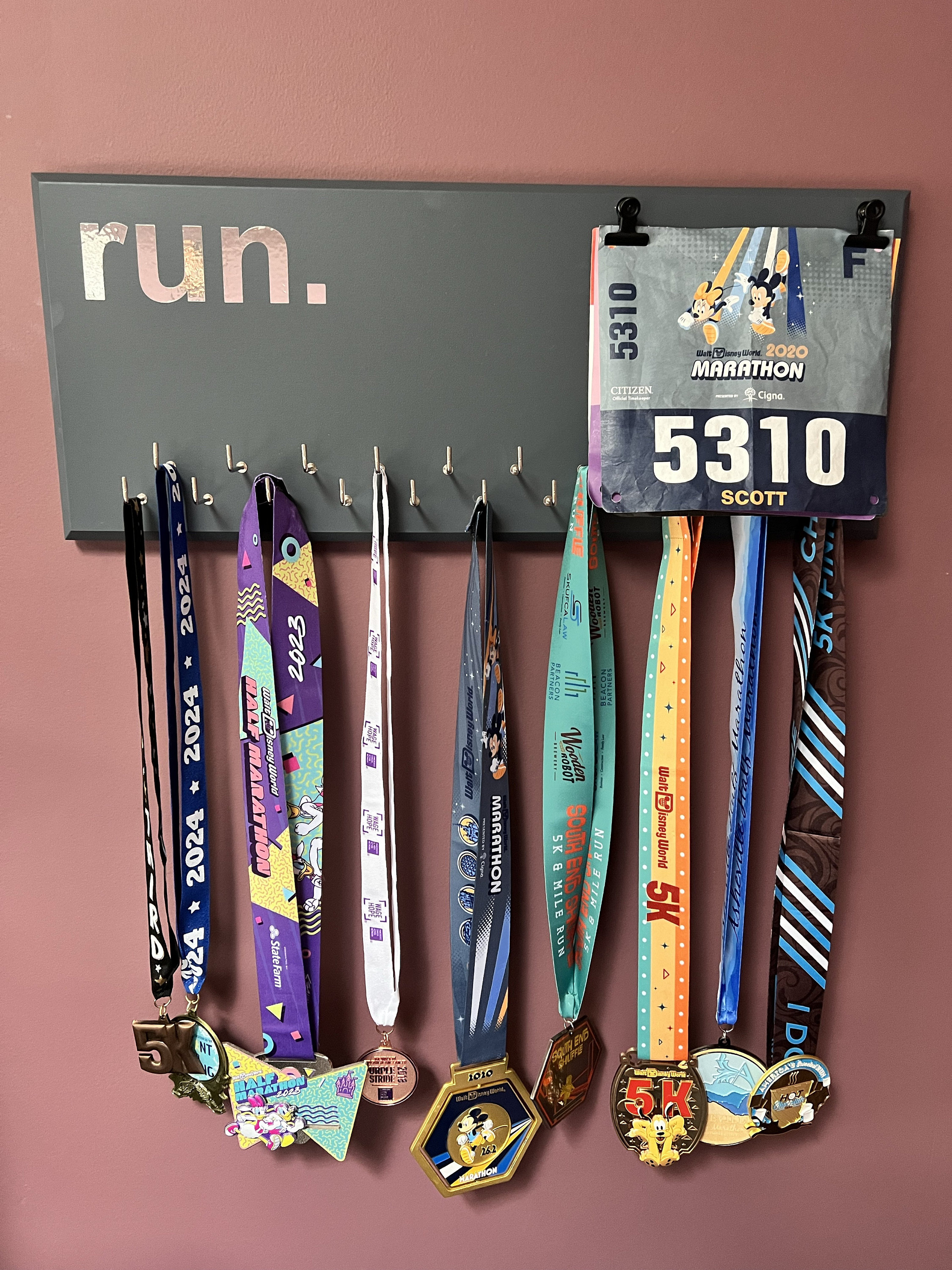 Running Medal Holder, gray or black with chrome "run." vinyl, 21 hooks and BIB holder