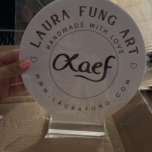Laura added a photo of their purchase