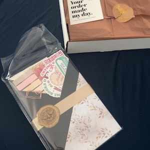 Amanda added a photo of their purchase