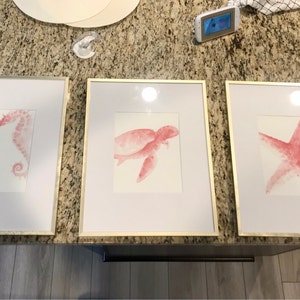 Marjorie added a photo of their purchase