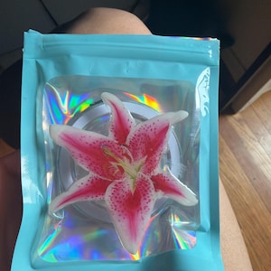 Ellie added a photo of their purchase