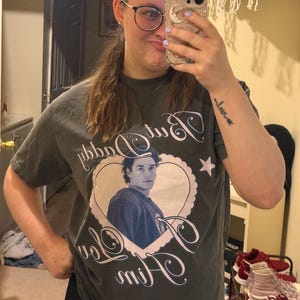 Kelly added a photo of their purchase