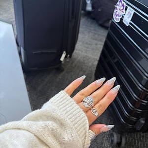 nora added a photo of their purchase