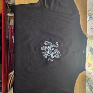 Mimi added a photo of their purchase