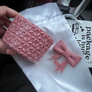 Noemi added a photo of their purchase