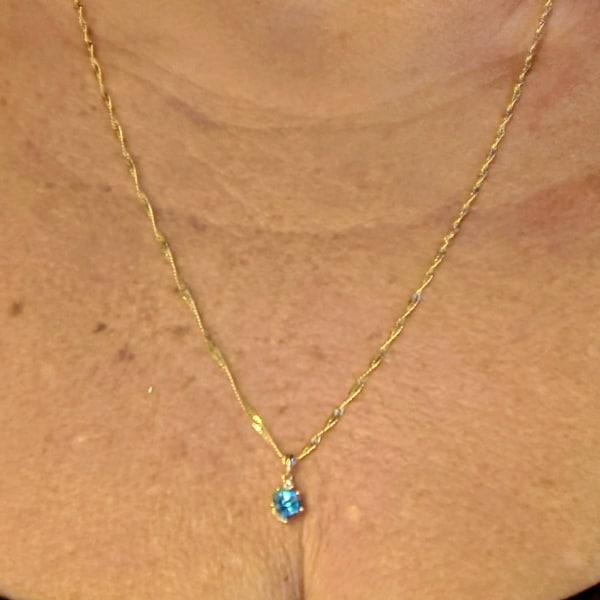275 Emerald Cross Pendant