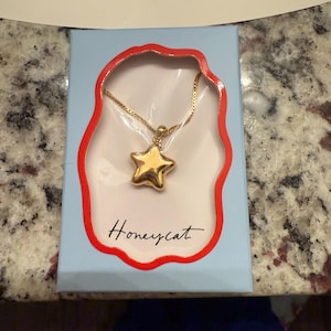 Kat added a photo of their purchase