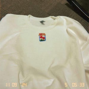 Mina added a photo of their purchase