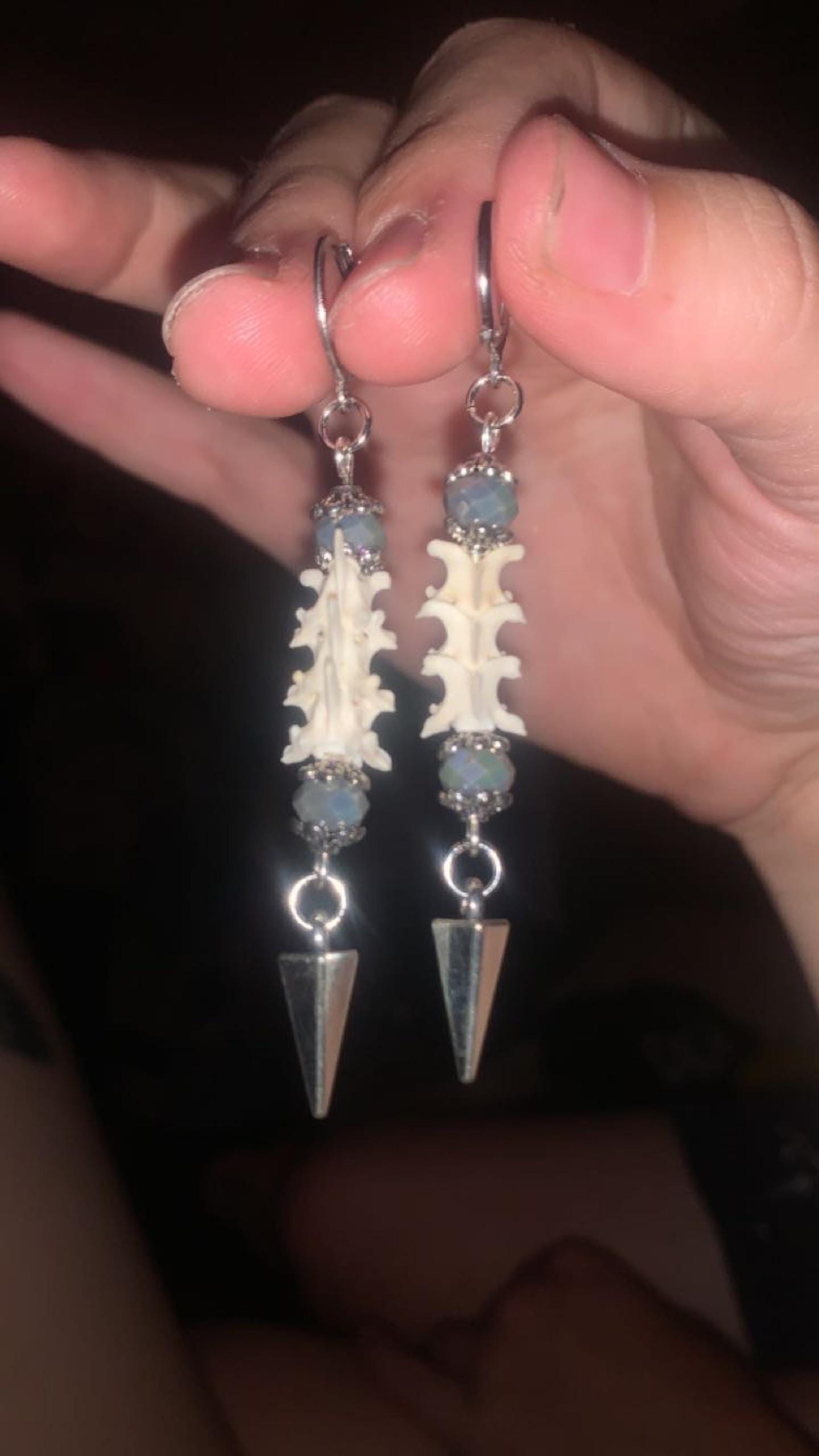 Exquisite Victorian-Era Inspired Coiled Rattlesnake Vertebrae Dangling, Earrings with Intricate Metalwork and Antique Brass Finish