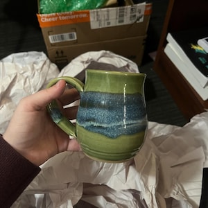 Alexa heeft een foto van de aankoop toegevoegd