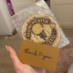Olivia added a photo of their purchase