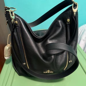 Ann added a photo of their purchase