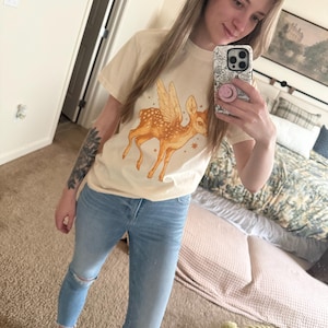 Ashley added a photo of their purchase