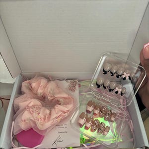 Jasmine added a photo of their purchase