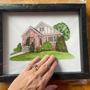 Catherine added a photo of their purchase