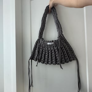 Gabriela added a photo of their purchase