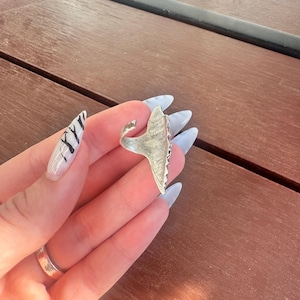 Nia added a photo of their purchase