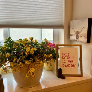 Michelle Wilson added a photo of their purchase