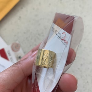 Kimberly added a photo of their purchase