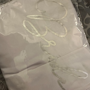 Alicia added a photo of their purchase