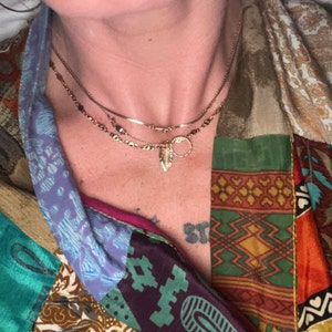 Gloria added a photo of their purchase