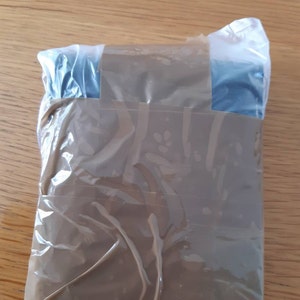 Sharon added a photo of their purchase