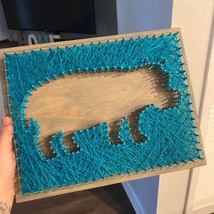 Angelica added a photo of their purchase