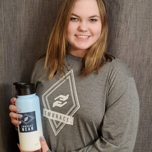 Nicole added a photo of their purchase