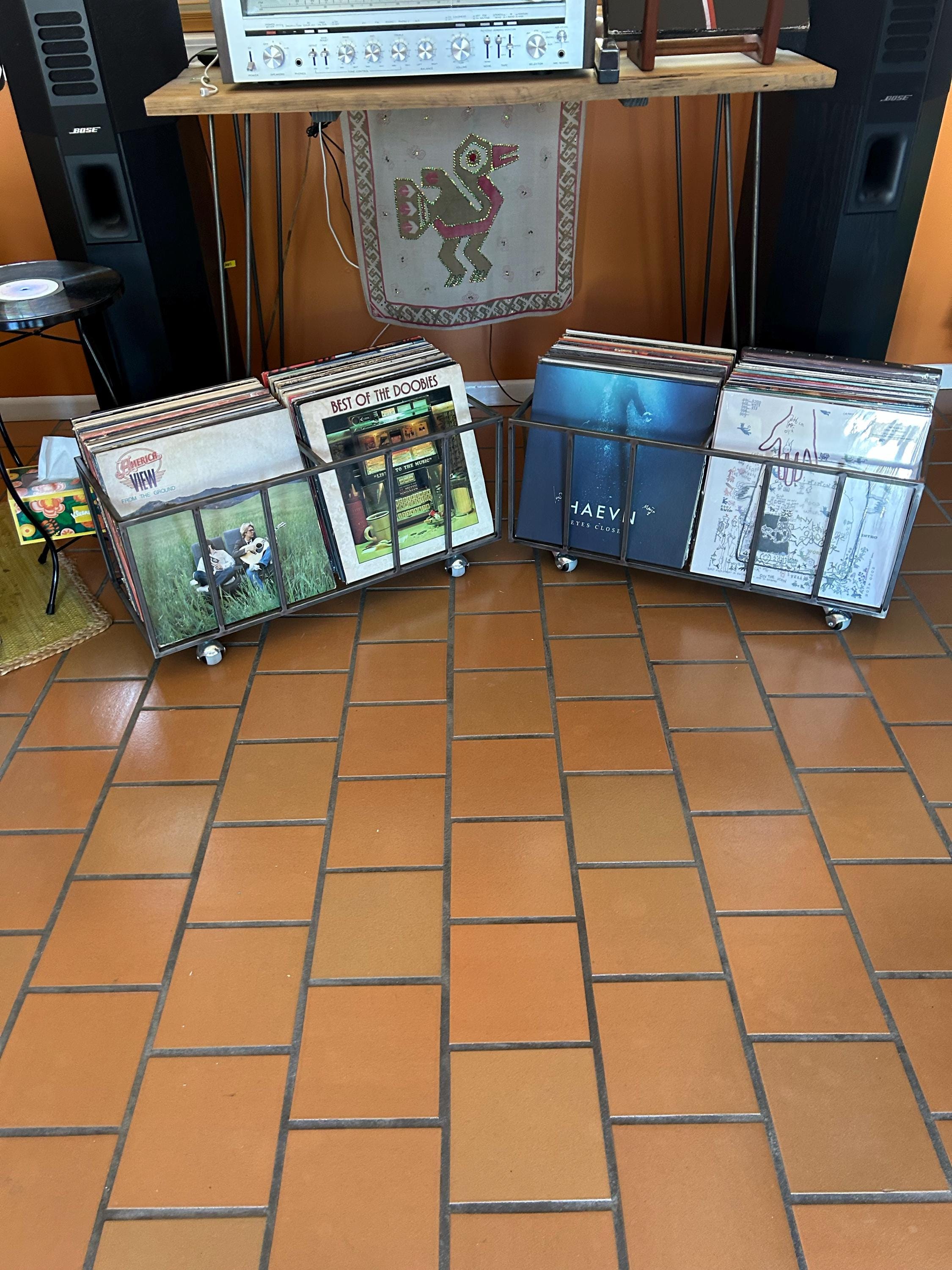 Two clear Atelier Article TWINS two-row vinyl record crates filled with LPs.