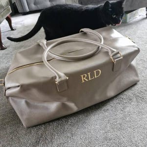 Rhiannon added a photo of their purchase