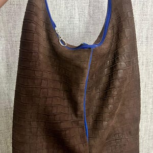 Özlem added a photo of their purchase