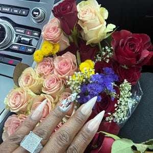 Toiesha added a photo of their purchase
