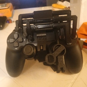 One-handed DualShock 4 by Akaki