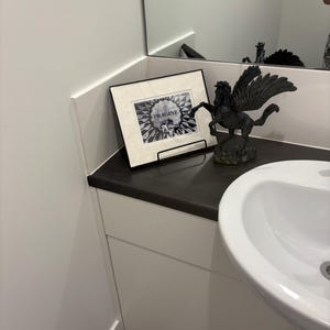 Tina added a photo of their purchase