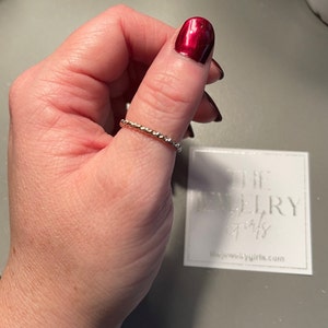 Angela added a photo of their purchase