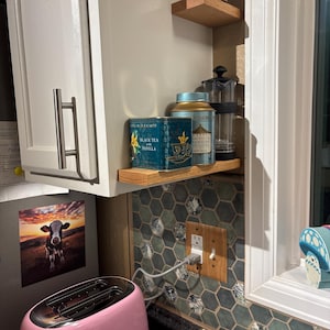 Sarah added a photo of their purchase