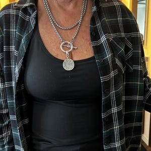 Lynette added a photo of their purchase