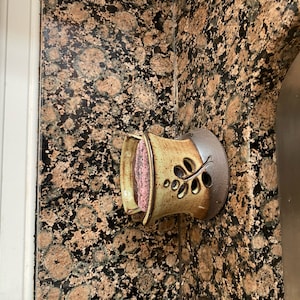 Joan added a photo of their purchase