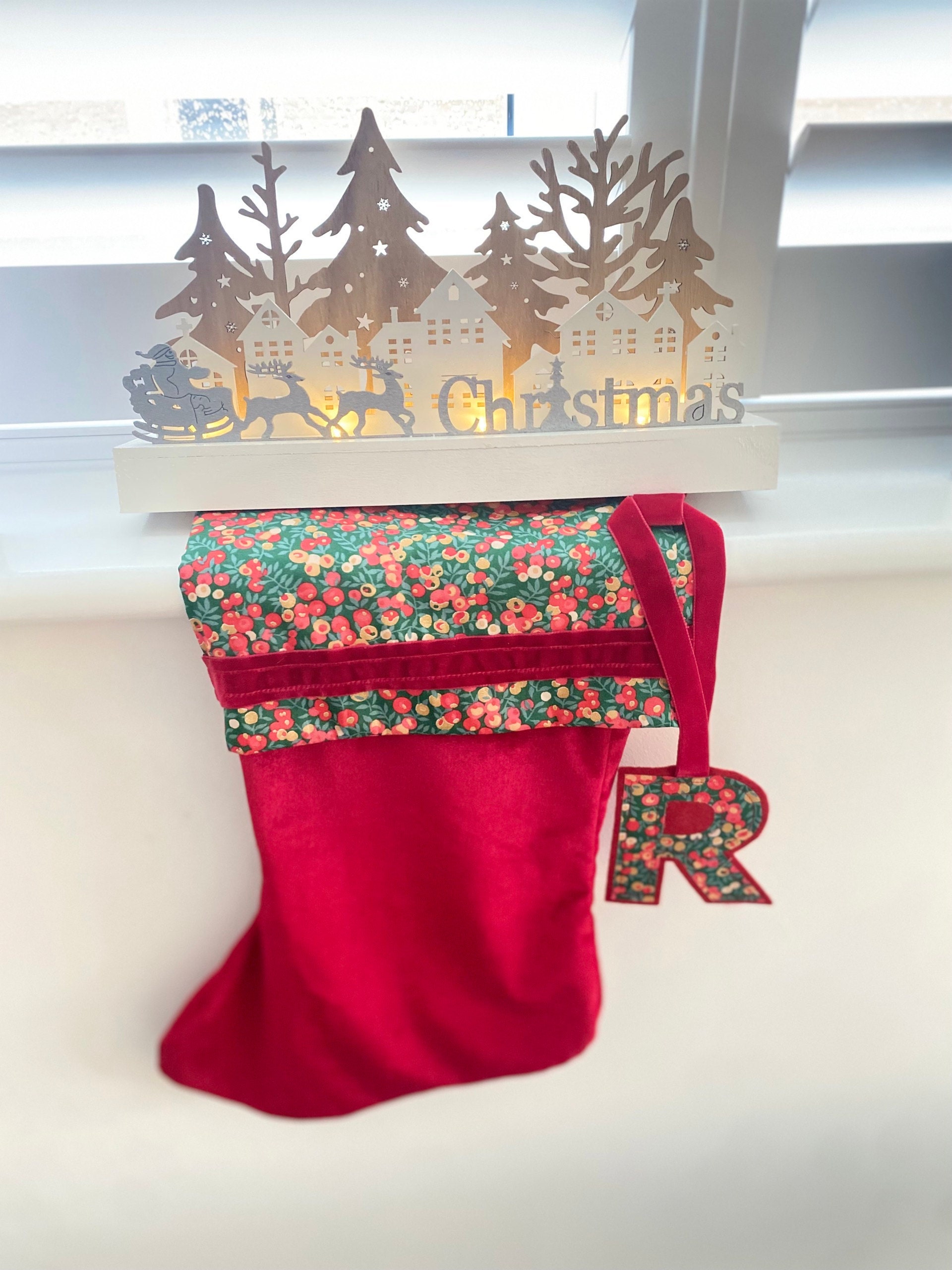 Liberty and velvet Christmas stocking with optional personalisation.