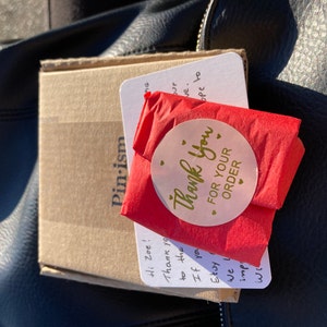 Zoe added a photo of their purchase