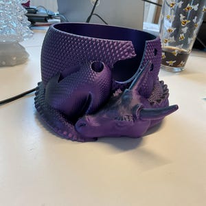 LAURA added a photo of their purchase