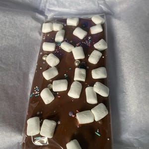 Lindsay added a photo of their purchase