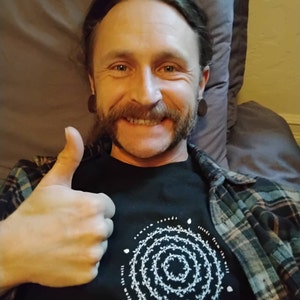 Kyle added a photo of their purchase