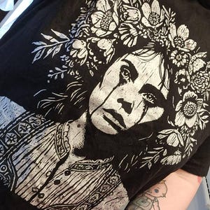 Sam added a photo of their purchase