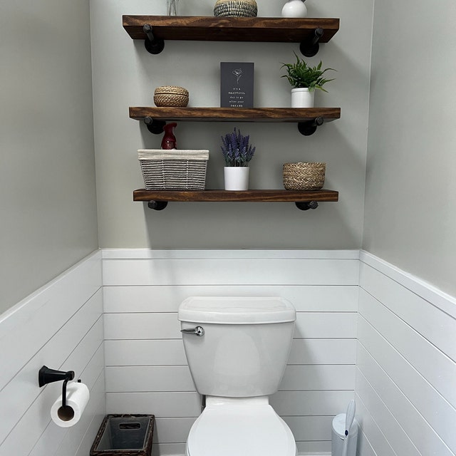shelves of different heights/widths behind tub in guest bathroom. Start the  shelves approx. 15 above tu…